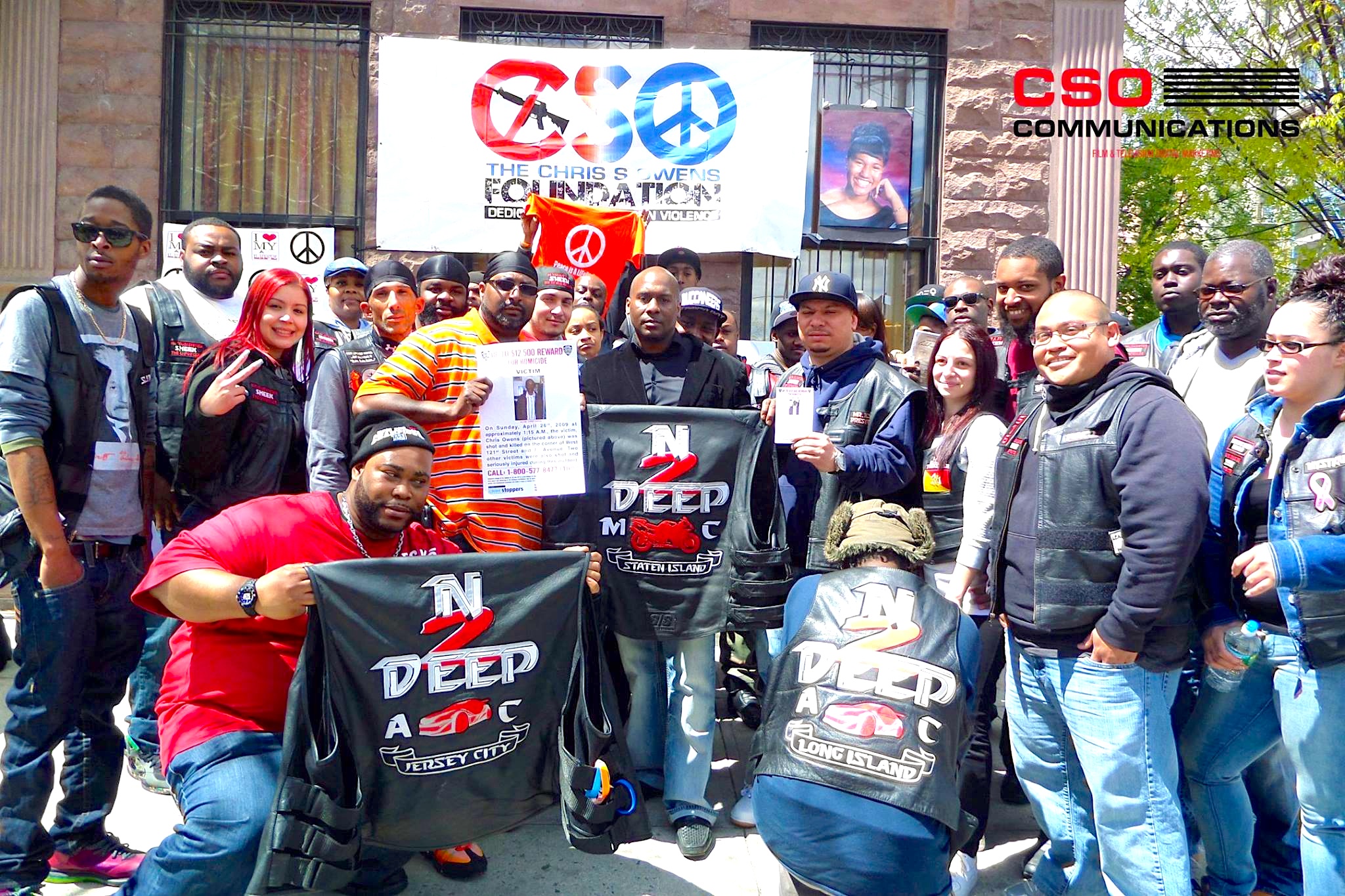 Chris Foye with community supporters and the CSO Foundation banner